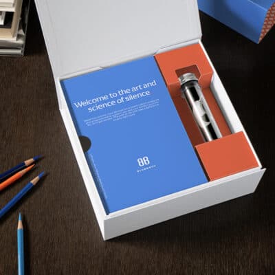 Blue and Orange package with tinnitus hearing devices.